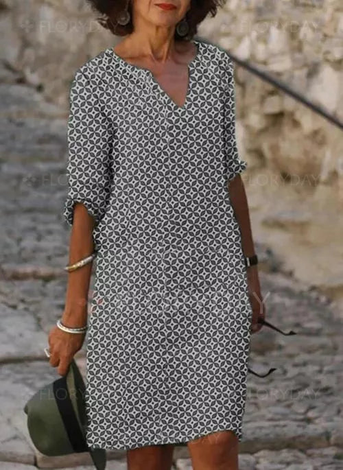 Robe d'été fluide pour femmes, coupe midi, idéale pour un look décontracté chic et un confort estival.
