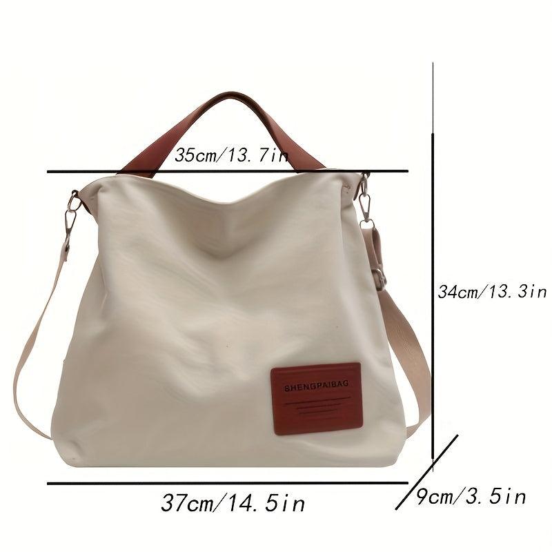 Élégant sac bandoulière minimaliste en toile, parfait pour un look casual chic. Accessoire mode polyvalent.