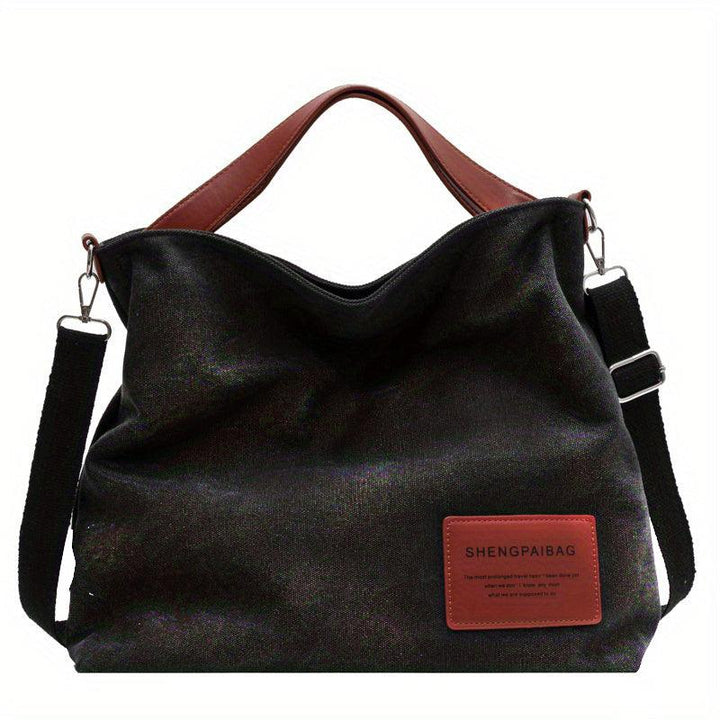Sac bandoulière minimaliste en toile, élégant et pratique. Accessoire mode unisexe pour un style épuré.