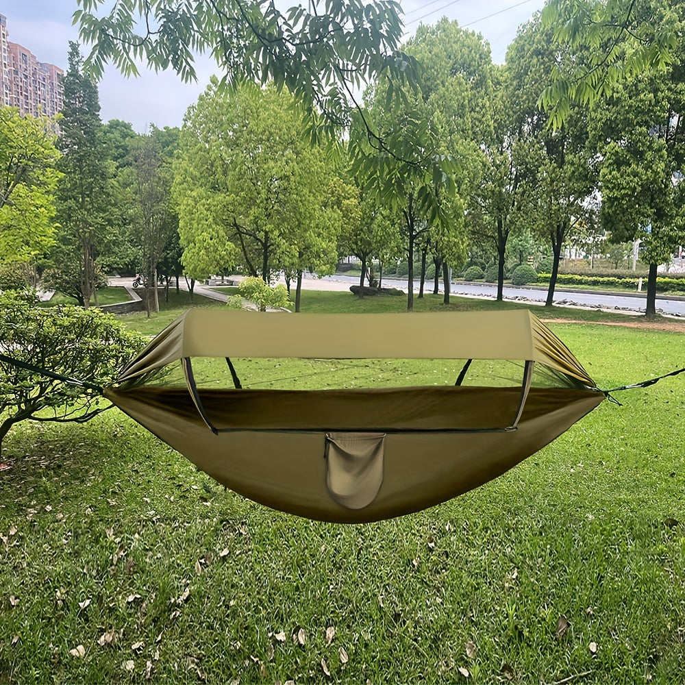 Hamac en nylon vert armée, 3-en-1 avec moustiquaire et pare-soleil. Parfait pour camping et randonnée.