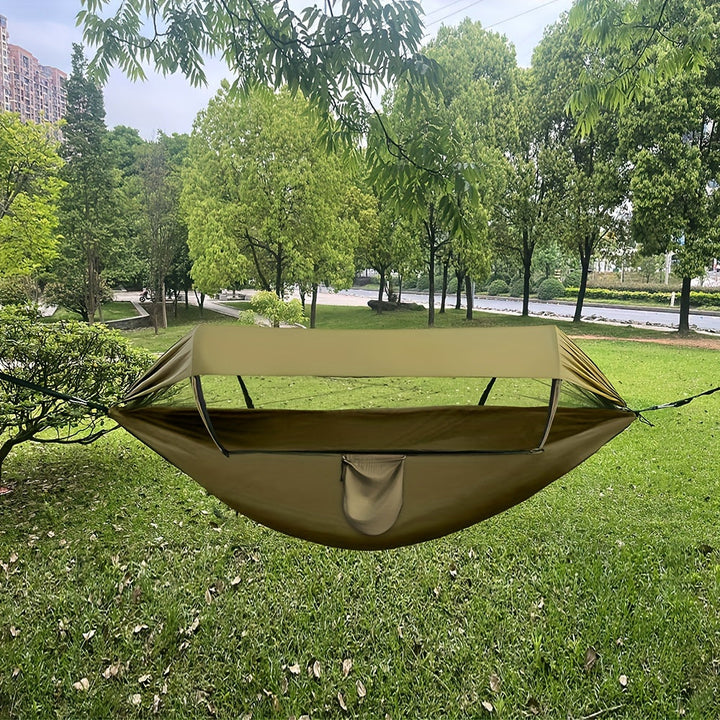 Hamac en nylon vert armée, 3-en-1 avec moustiquaire et pare-soleil. Parfait pour camping et randonnée.