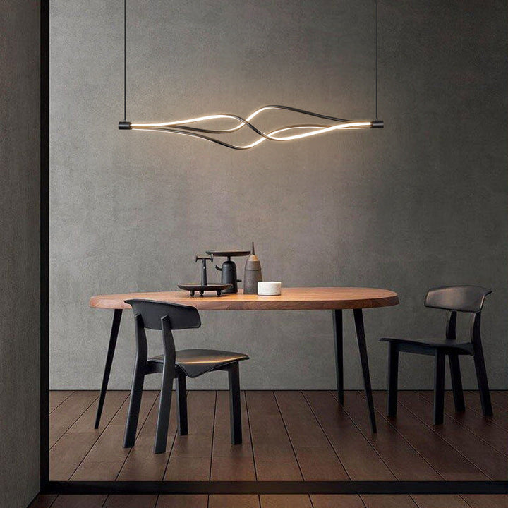Lampe LED suspendue élégante, apportant une touche moderne à la décoration intérieure de votre cuisine ou salon.