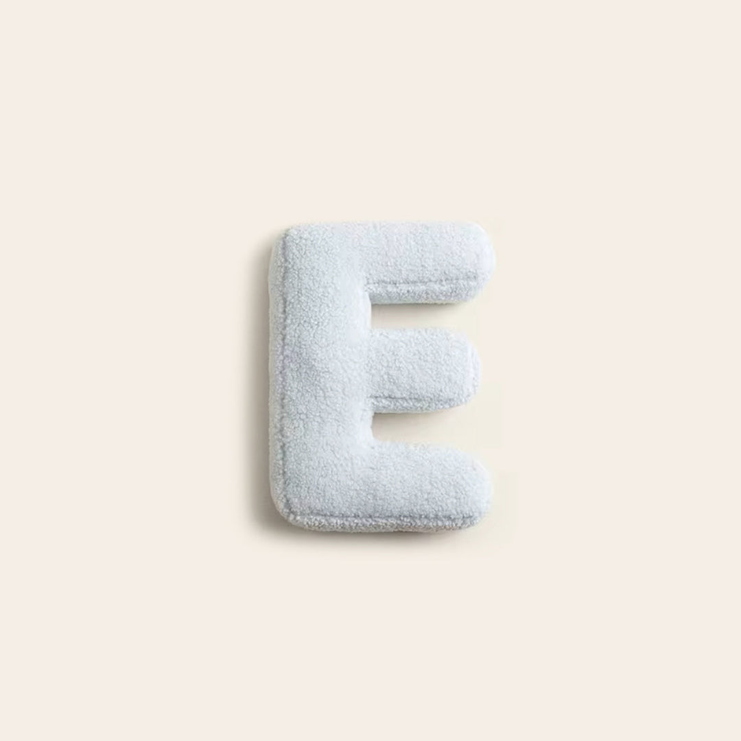 Chambre d'enfant: coussin alphabet F en coton, motif ludique.