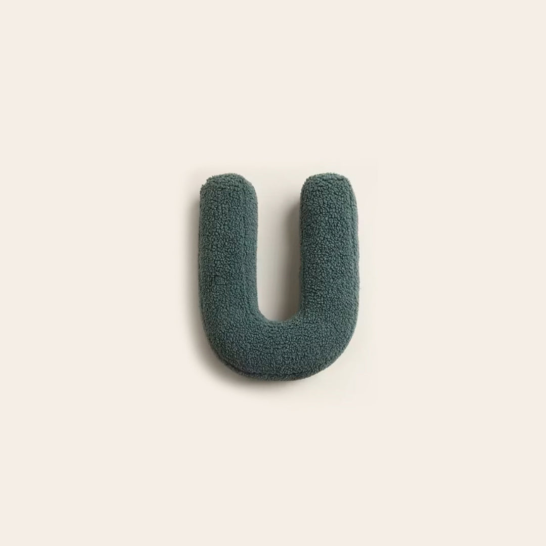 Coussin personnalisé U, idéal pour personnaliser une chambre d'enfant.