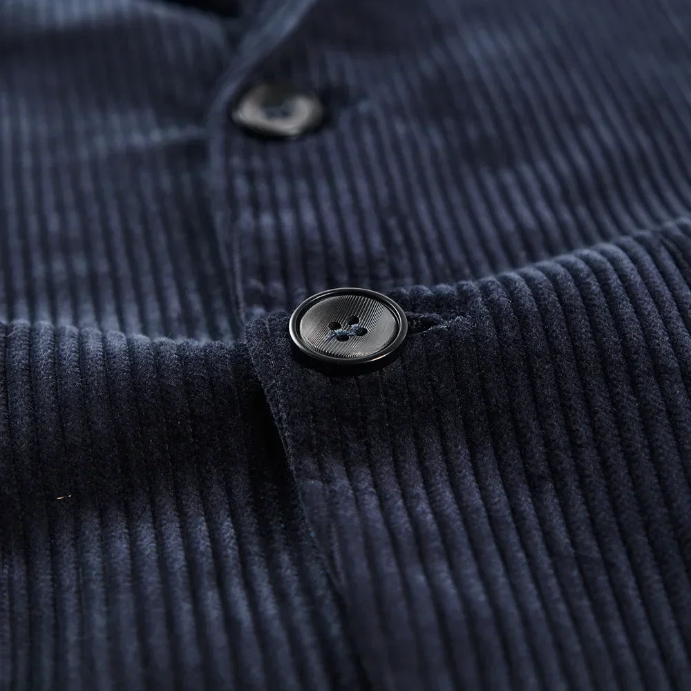 Texture de la veste blazer homme moderne en laine mélangée, chic et confortable pour l'automne.