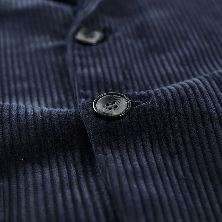 Texture de la veste blazer homme moderne en laine mélangée, chic et confortable pour l'automne.