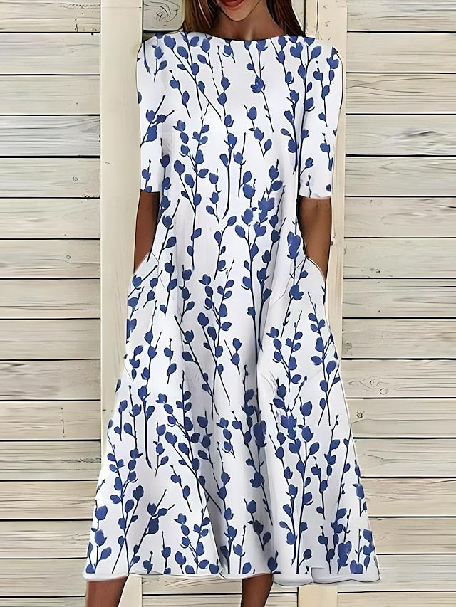 Robe midi d'été pour femme, imprimé floral éclatant, col rond et coton doux. Tenue élégante et décontractée.