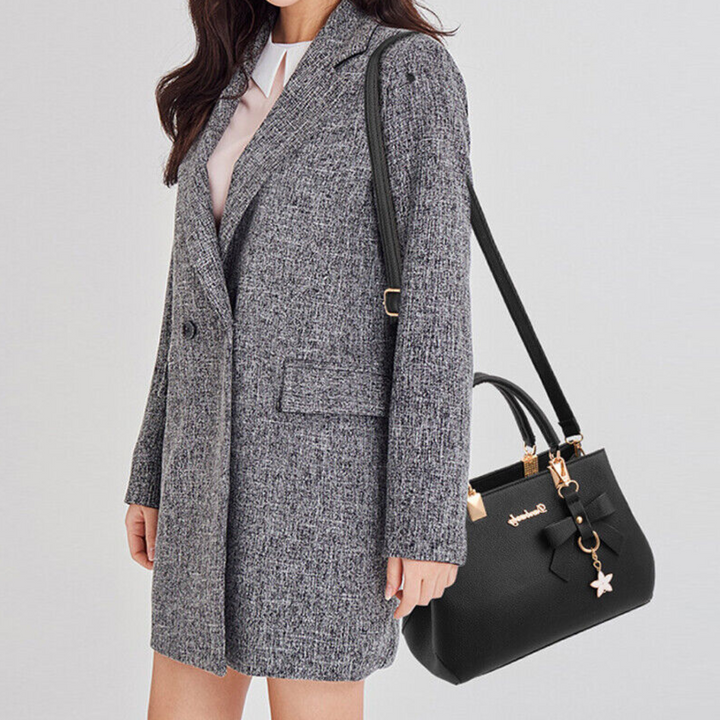 Sac à main femme bandoulière réglable. Élégant accessoire de mode pour un look quotidien ou soirée.
