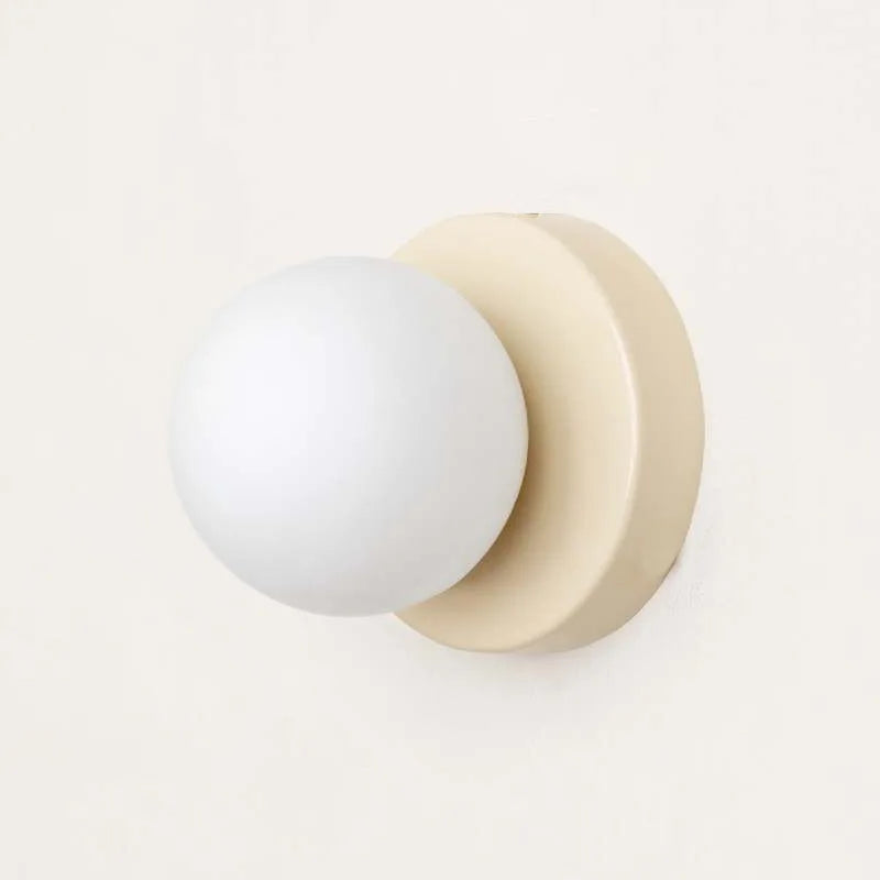 Applique murale LED Macaron moderne, design contemporain. Lumière douce idéale pour ambiance intérieure.