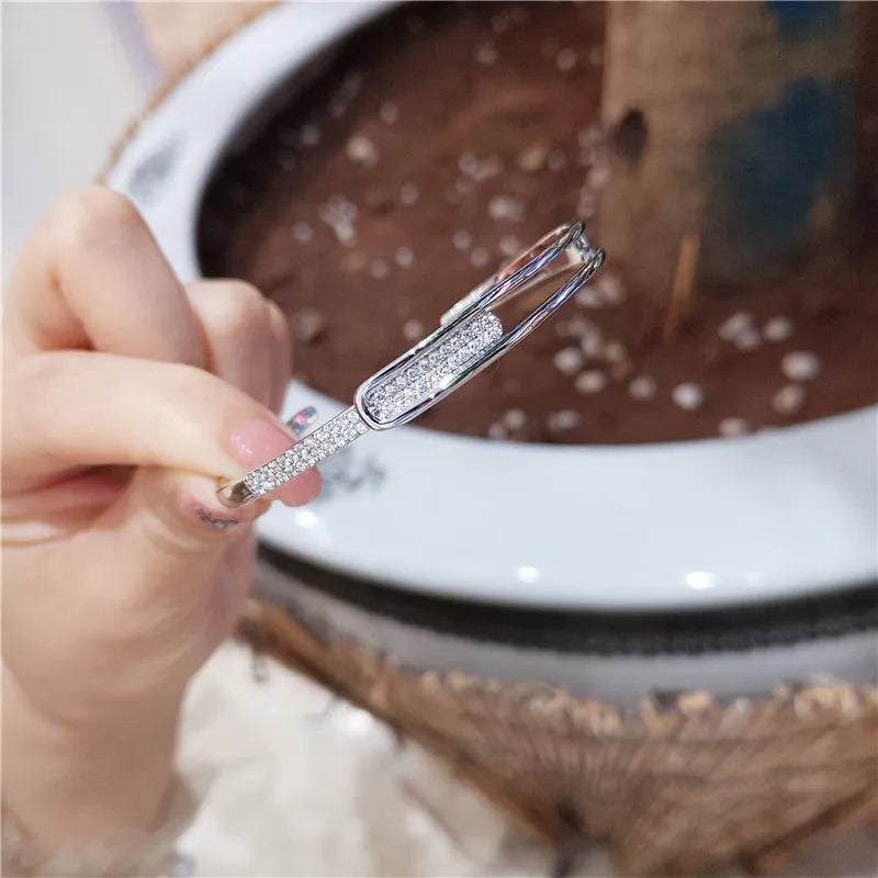 Bracelet ouvert pour femme, en argent 925 de qualité supérieure avec zirconia étincelante.