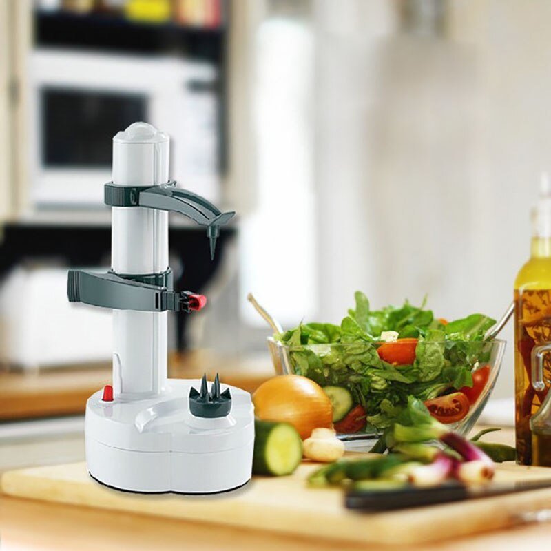 Appareil éplucheur électrique automatique, parfait pour éplucher carottes, pommes de terre et légumes sans effort.