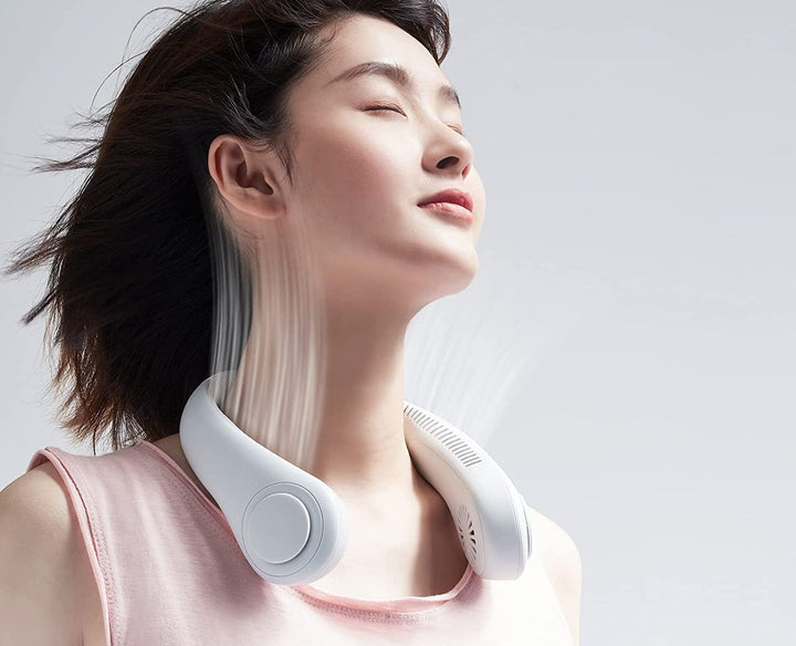 Rafraîchissez-vous avec ce ventilateur portable 360° tour de cou. Distribution d'air omnidirectionnelle pour un confort total.