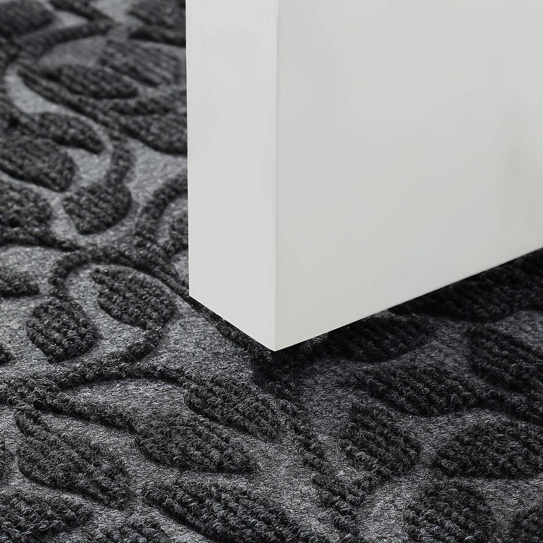 Tapis de sol d'entrée, robuste, antidérapant, pour une protection optimale et un style épuré.
