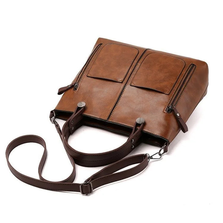 Sac de travail femme en cuir PU gris, spacieux et chic, avec bandoulière confortable.