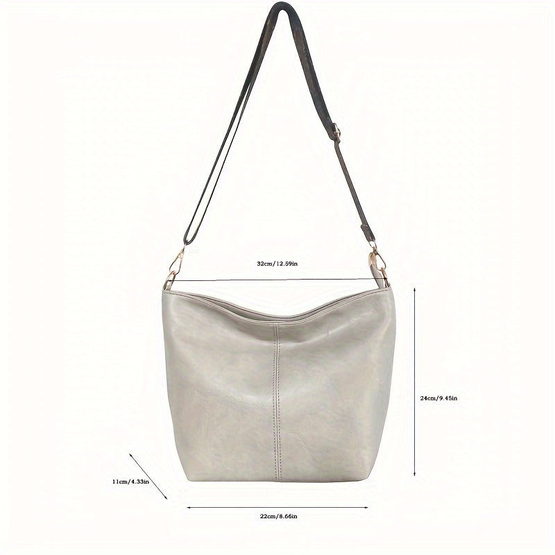 Sac bandoulière femme chic géométrique, grande capacité, touches rétro pour un style unique.