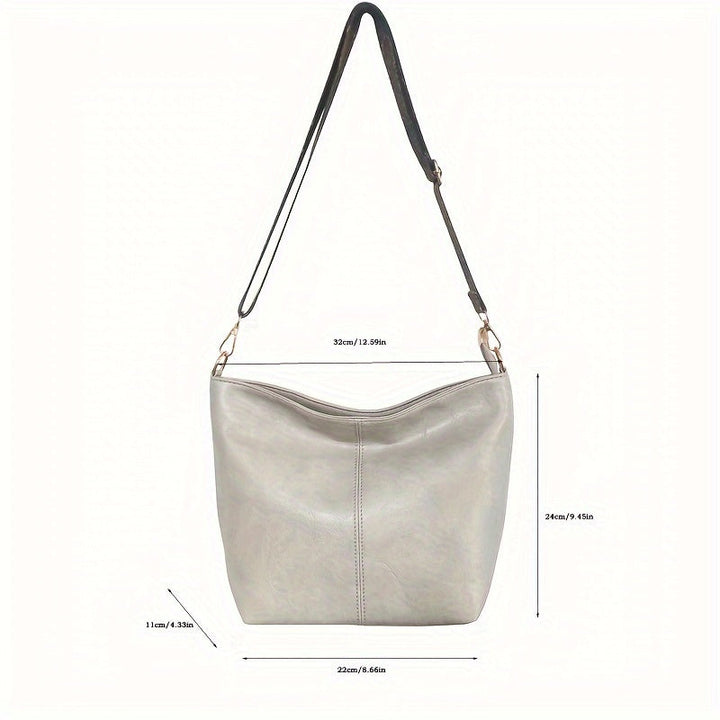 Sac bandoulière femme chic géométrique, grande capacité, touches rétro pour un style unique.
