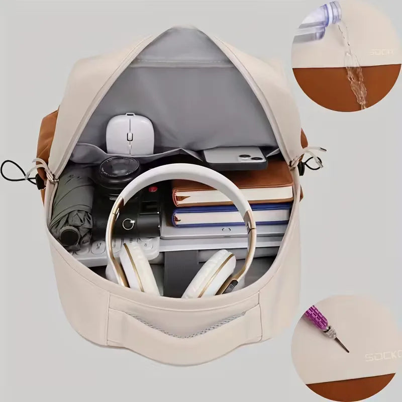 Accessoire urbain unisexe moderne : sac à dos imperméable bicolore offrant confort et style.