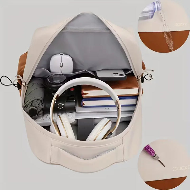 Accessoire urbain unisexe moderne : sac à dos imperméable bicolore offrant confort et style.