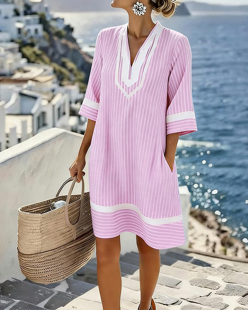 Robe femme à rayures polyvalente, col V et manches courtes. Confortable et élégante pour la mode été.