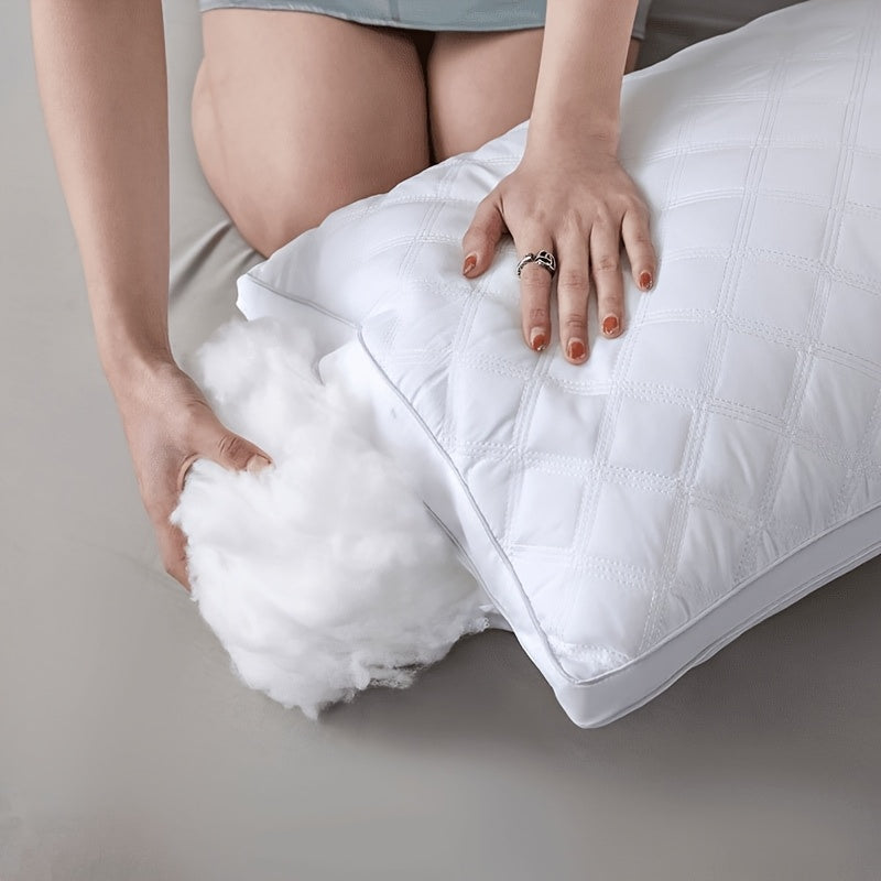 Deux oreillers 3D anti-acariens, extra moelleux, garantissant un confort supérieur pour un sommeil réparateur.