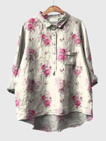 Chemisier femme printanier, imprimé floral vibrant, un vêtement chic et stylé.