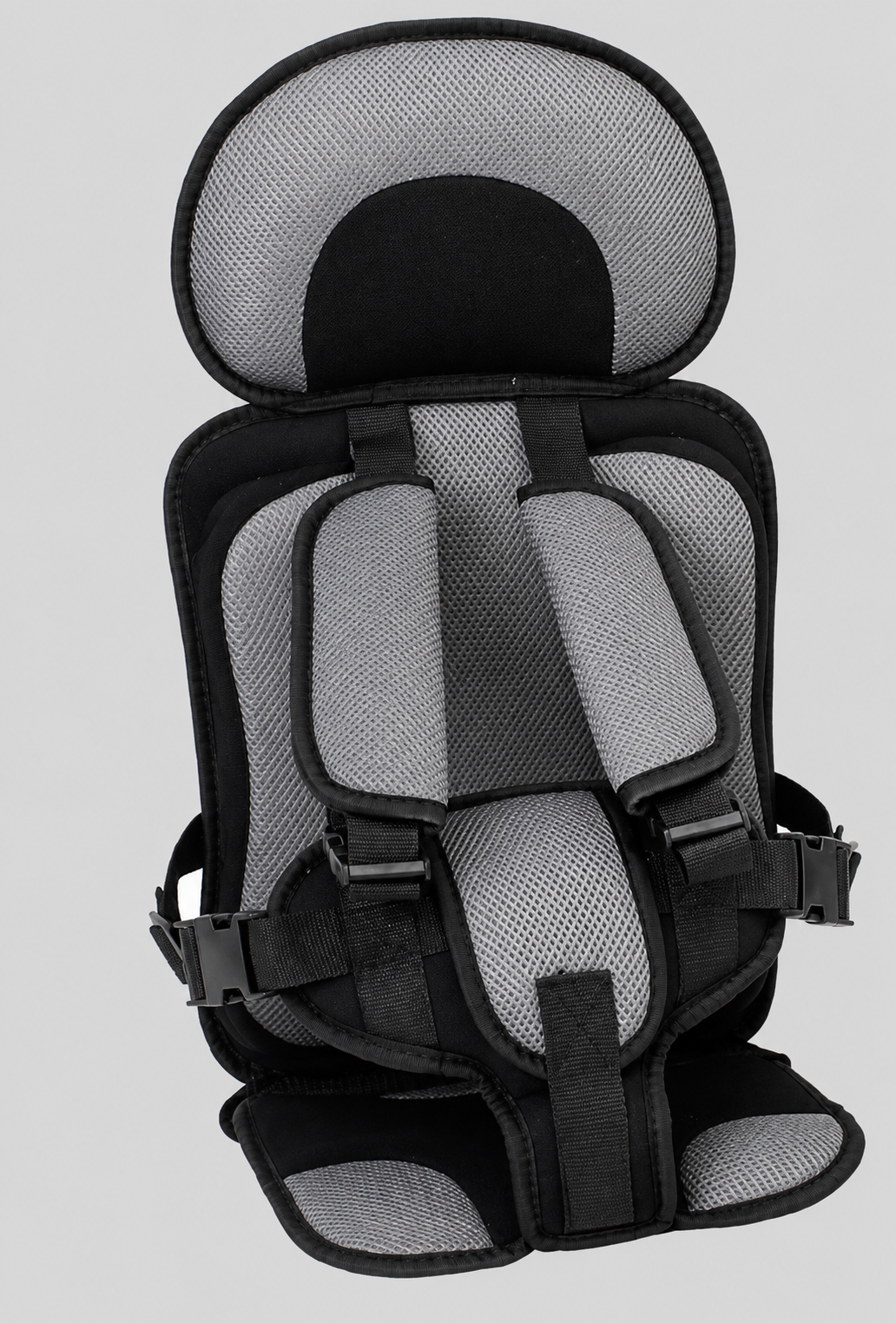 Siège d'appoint pour enfants, mettant en avant sa légèreté et sa facilité de transport.