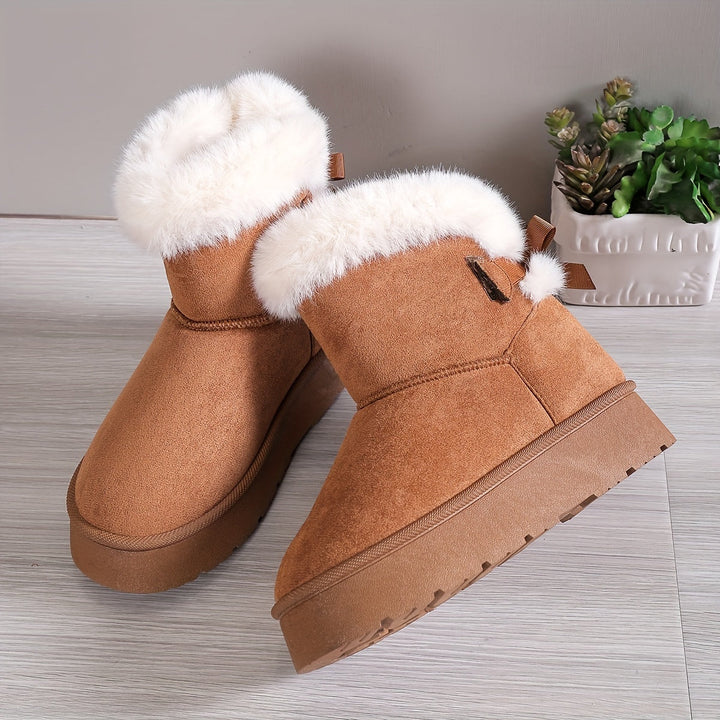 Bottes d'hiver femme avec excellent confort et protection contre le froid. Semelle sécurisée pour la neige.