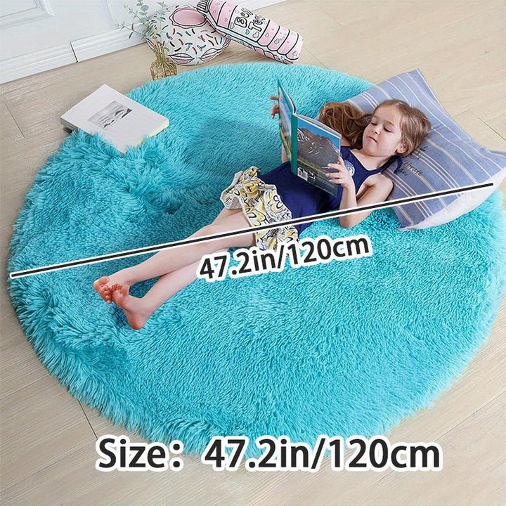 Tapis rond doux Clouda pour espace enfant, moelleux et sécurisé.