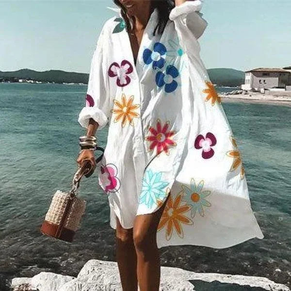 Superbe robe midi blanche à manches longues. Style chic et élégance pour la mode féminine. Idéale pour l'été.
