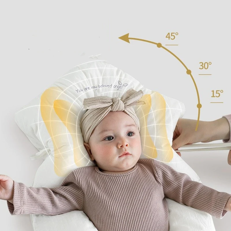 Coussin sommeil bébé en coton hypoallergénique pour nouveau-né, assurant un confort optimal et un développement sécurisé.