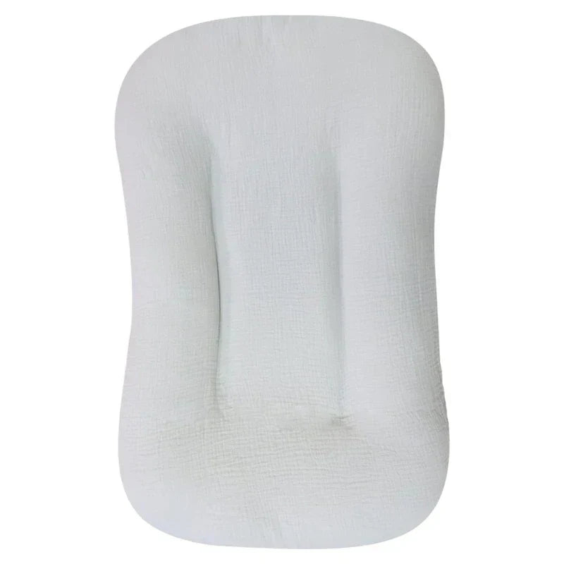 Transat bébé ergonomique pour un sommeil sécurisé, un cocon de repos pour nouveau-né.