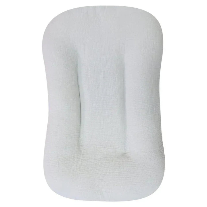 Transat bébé ergonomique pour un sommeil sécurisé, un cocon de repos pour nouveau-né.