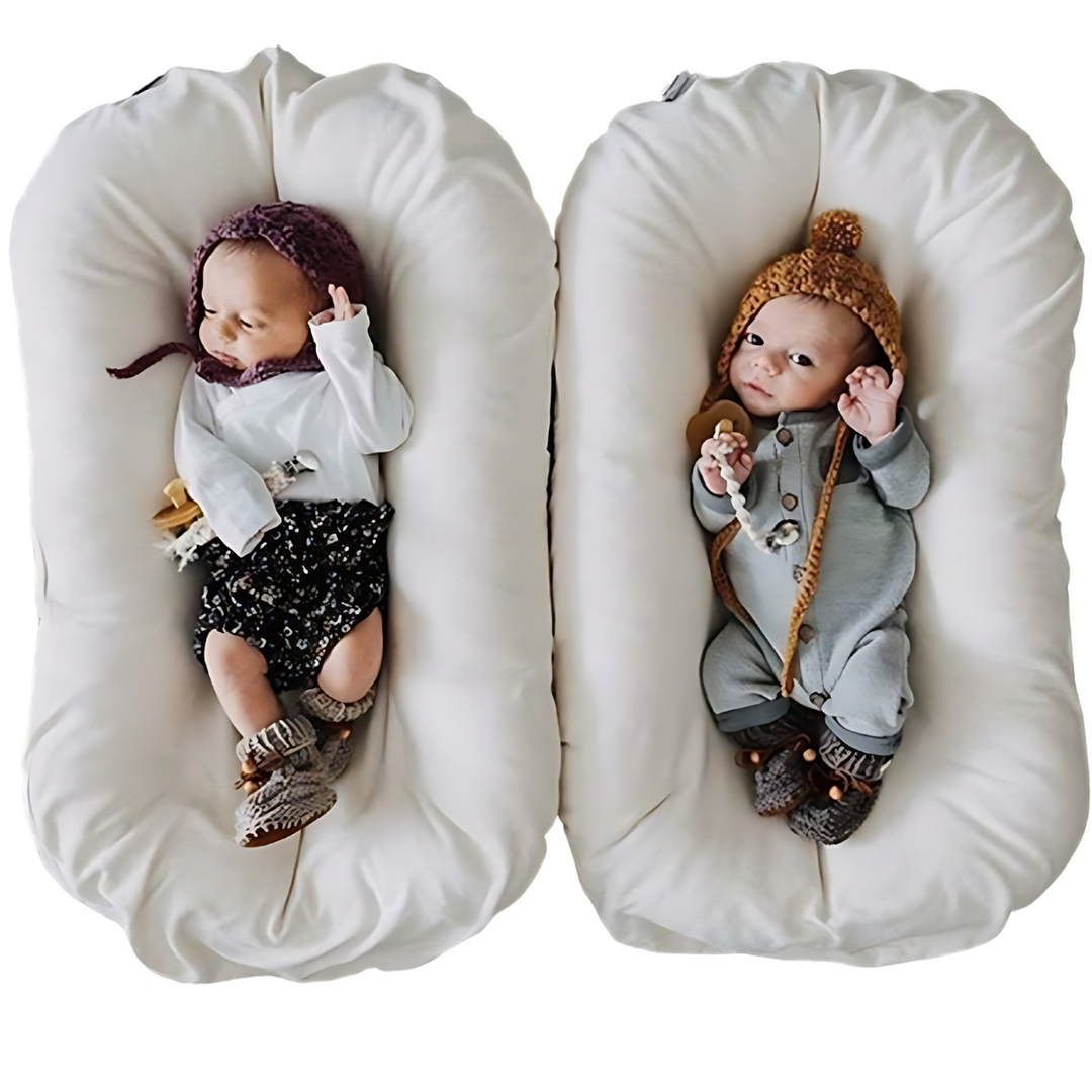 Transat bébé ergonomique offrant un sommeil sécurisé et un soutien optimal au nouveau-né.