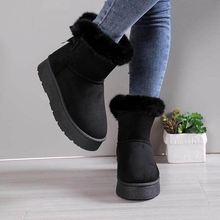Chaussures d'hiver femme robustes avec semelle antidérapante. Protection optimale contre le froid et la neige.