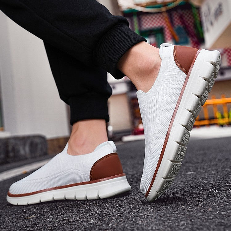 Chaussures homme à enfiler pour la marche, respirantes et légères. Idéales pour un confort quotidien et un style décontracté.