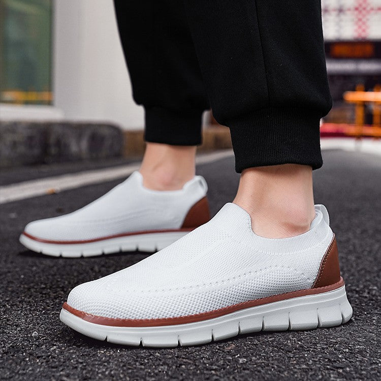 Sneakers homme à enfiler en maille respirante, noires. Parfaites pour un style décontracté et un confort tout au long de la journée.