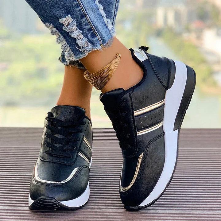 Baskets basses femme vibrantes style color block, chaussures mode décontractées pour un look urbain tendance.