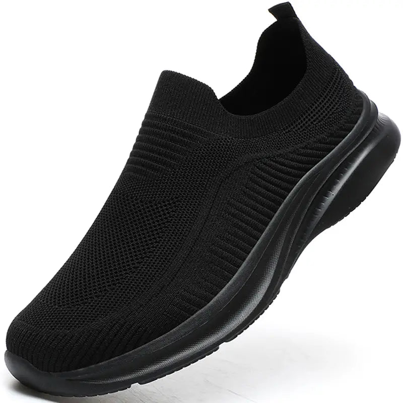 Semelle adhérente et flexible des baskets de marche unisexes, offrant amorti et stabilité pour toutes activités.