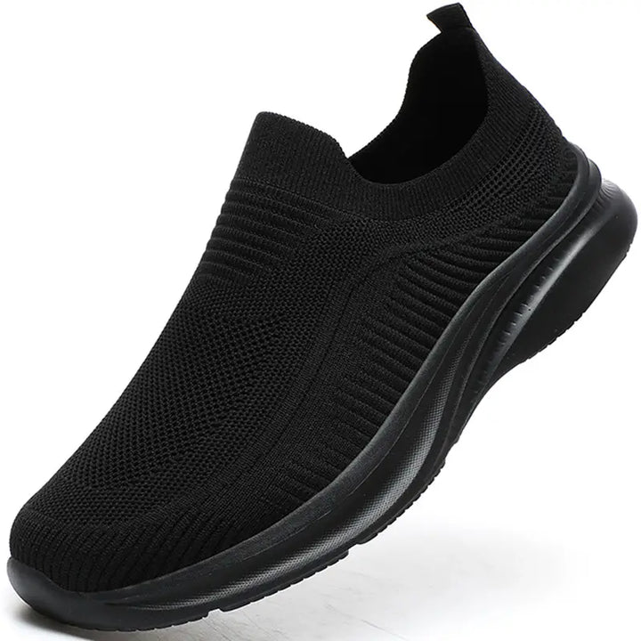Semelle adhérente et flexible des baskets de marche unisexes, offrant amorti et stabilité pour toutes activités.