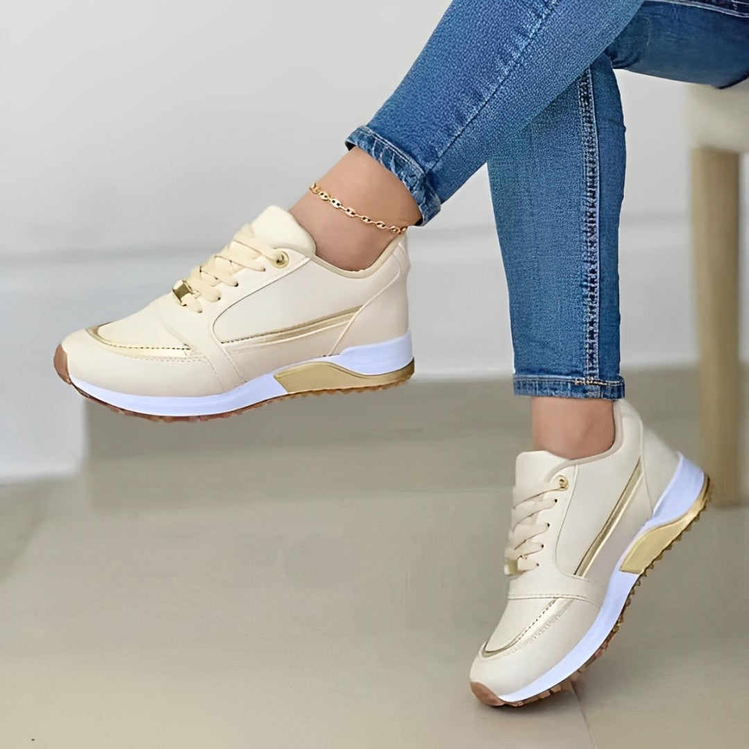 Baskets femmes confortables avec amorti, détails métallisés chics. Idéales pour un style urbain tendance au quotidien.