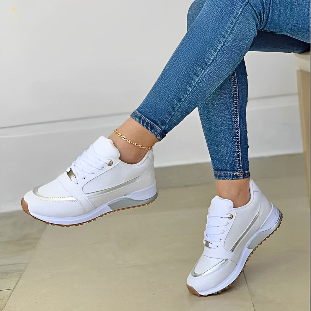 Baskets tendance pour femmes, offrant un confort optimal et un amorti doux. Finition métallisée chic pour un look mode.