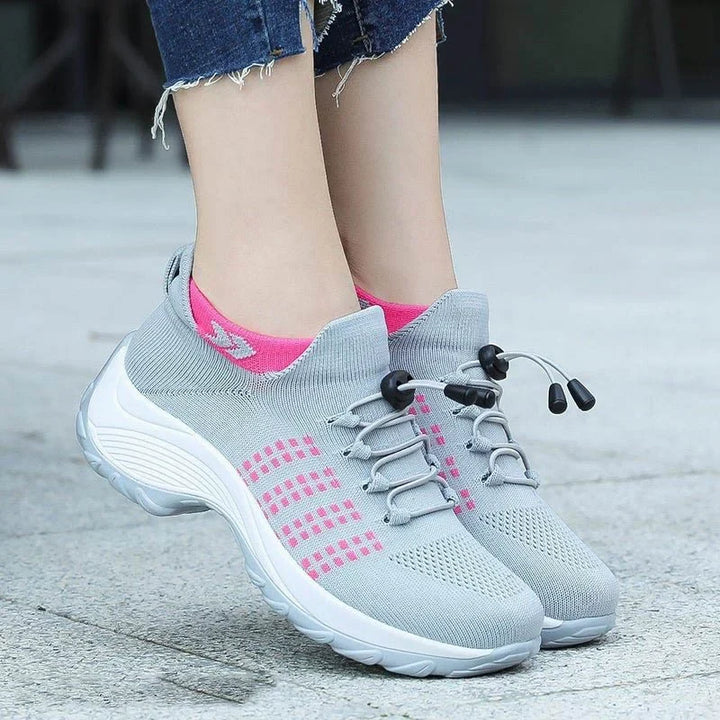 Baskets femme respirantes, design élégant, parfaites pour le sport et le bien-être des pieds.