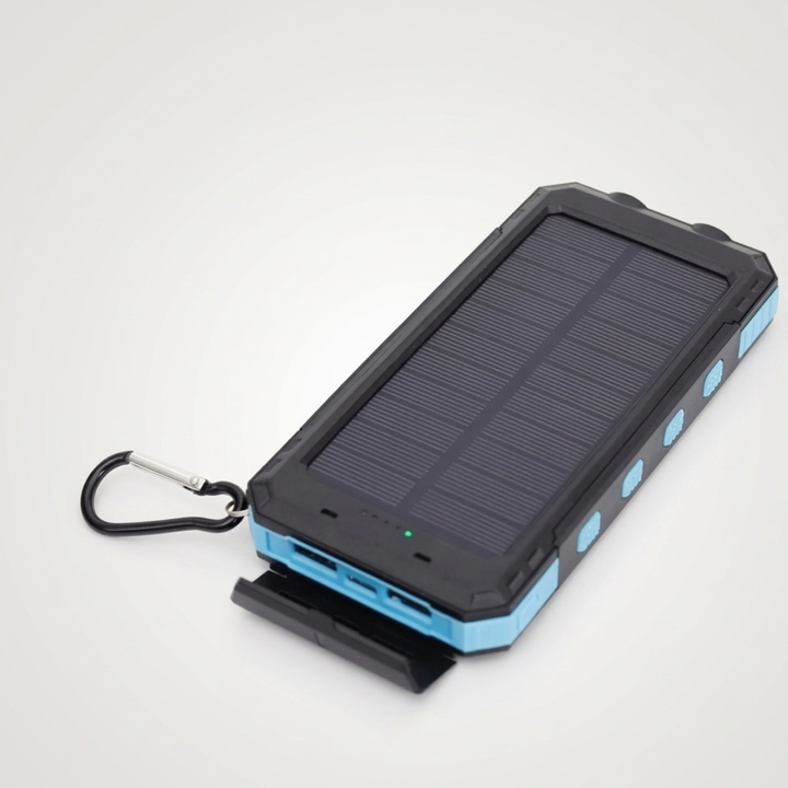 Batterie de secours solaire 10000mAh avec compas, essentielle pour la randonnée.