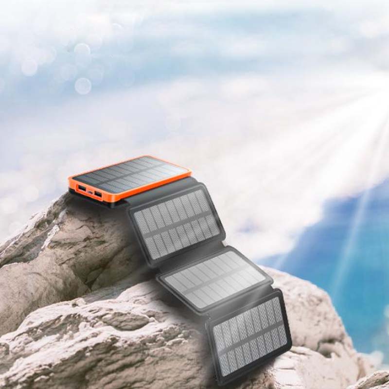 Batterie externe solaire pliante, étanche, indispensable pour le voyage et l'aventure.