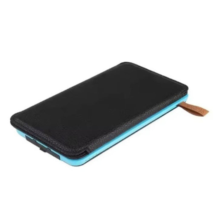 Batterie externe solaire pliante et étanche, parfaite pour camping, voyage et survie.