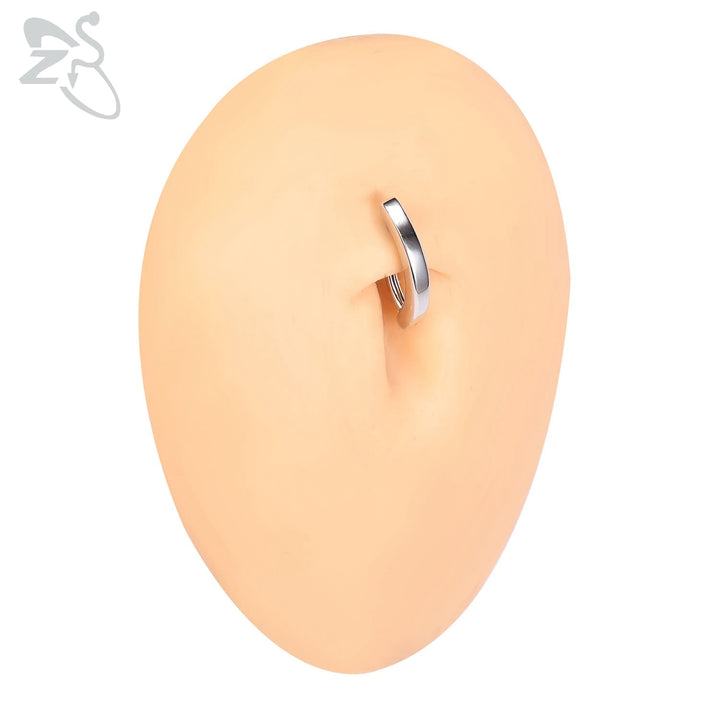 Piercing nombril argent 925, style été, scintillant et tendance pour un look féminin moderne.