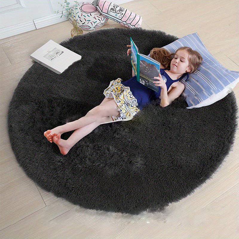 Tapis de salon rond Clouda, élégant et moelleux, transforme votre intérieur.