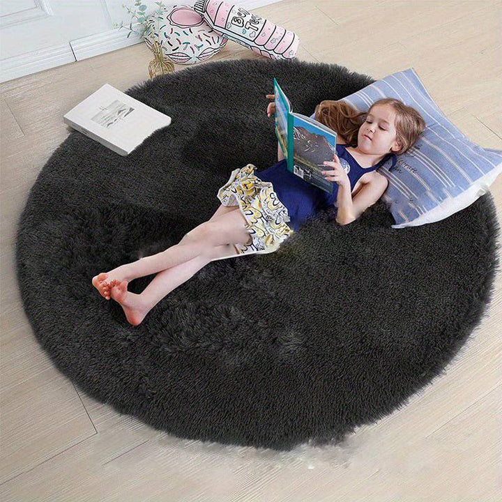 Tapis de salon rond Clouda, élégant et moelleux, transforme votre intérieur.