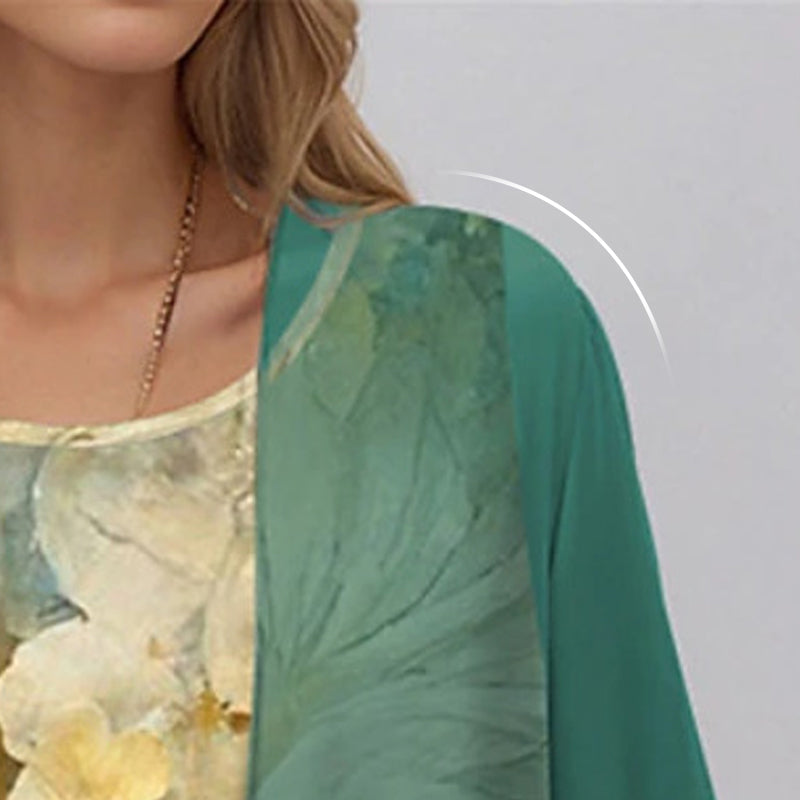 Robe d'été fleurie élégante pour femme, style midi chic, mode féminine raffinée et confortable.
