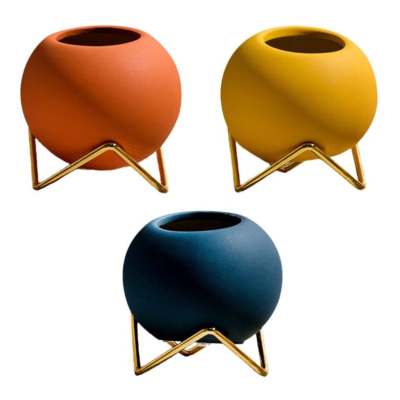 Pot de fleurs nordique en céramique avec support métal, idéal pour plantes d'intérieur et succulentes.